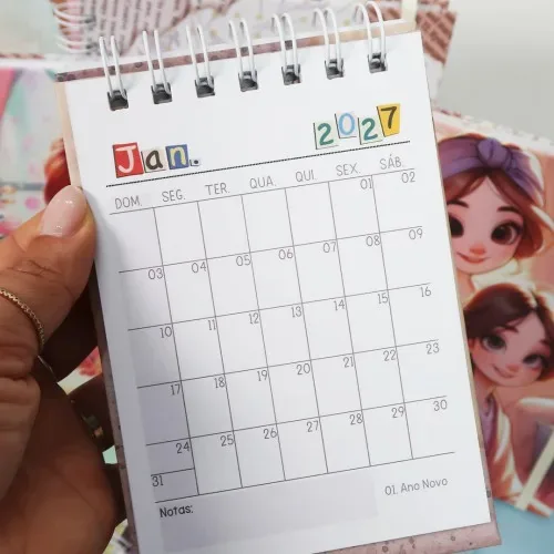 2027 desk calendar held in hand