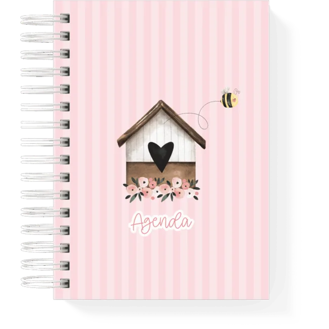 Pink agenda cover with birdhouse